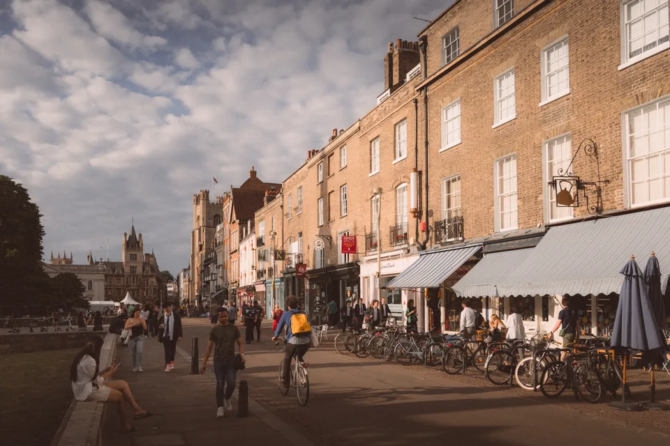 A street of shopfronts and bicycles
