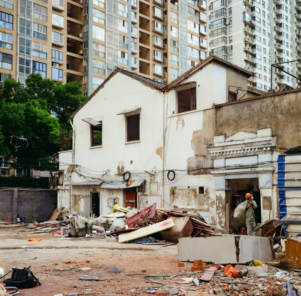 A house among demolition rubble