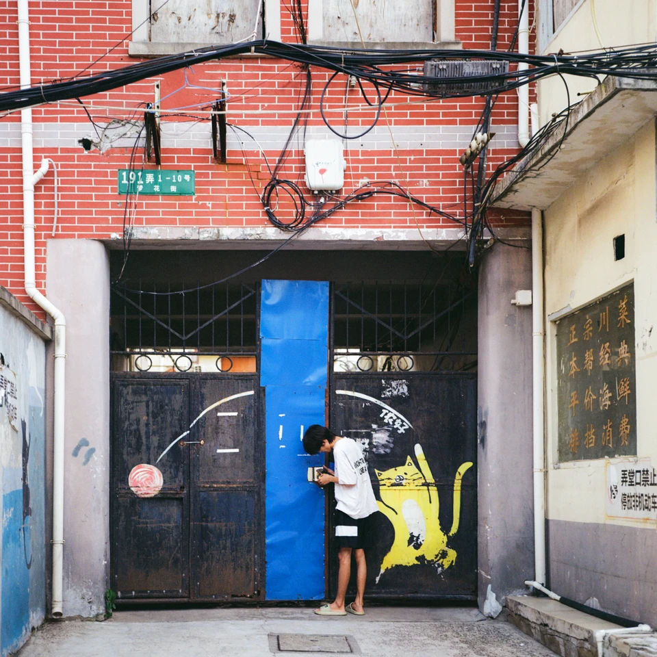 A doorway with a painted cat