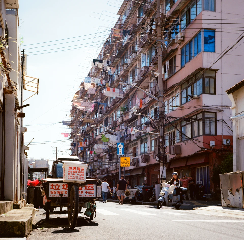 A street of laundry-draped blocks